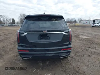 2024 Cadillac XT6 AWD Sport z VIN 1GYKPHRS8RZ750238, wystawiony jako IAAI lot #41769814 z przebiegiem 3600 mil mil oraz . Historia ofert i sprzedaży dostępna na DreamBid. Obrazek 17.