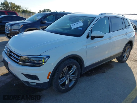 2018 Volkswagen Tiguan SEL Premium with VIN 3VV5B7AX2JM202908, listed as a IAAI auction lot 41137619 with 84,323 mi miles and . Bid and sale history available at DreamBid. Image 18.