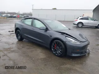 2022 Tesla Model 3 Performance with VIN 5YJ3E1EC2NF336135, listed as a IAAI auction lot 41853826 with Not Provided miles. Bid and sale history available at carsss.com. Image 1.