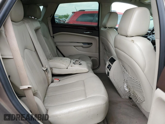 2014 Cadillac SRX Luxury Collection z VIN 3GYFNBE3XES626319, wystawiony jako Copart lot #54776405 z przebiegiem 107 734 mil mil oraz Szkoda całkowita • Salvage title. Historia ofert i sprzedaży dostępna na DreamBid. Obrazek 10.
