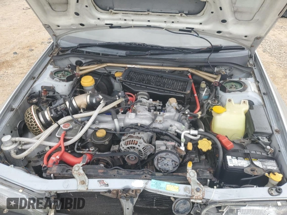 1995 Subaru Impreza with VIN GC8030988, listed as a Copart auction lot 70242354 with 123,696 mi miles and Salvage title. Bid and sale history available at DreamBid. Image 11.