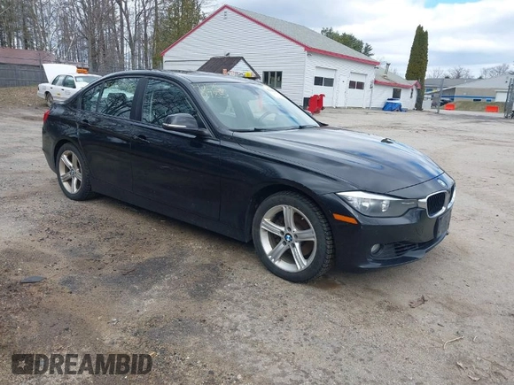 2013 BMW 3 Series 328i xDrive with VIN WBA3B5C5XDF597184, listed as a IAAI auction lot 42060785 with 205,559 mi miles. Bid and sale history available at carsss.com. Image 1.