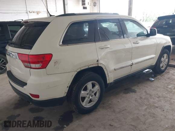 2011 Jeep Grand Cherokee Laredo with VIN 1J4RR4GG2BC511244, listed as a IAAI auction lot 42759855 with 269,220 mi miles and . Bid and sale history available at DreamBid. Image 4.