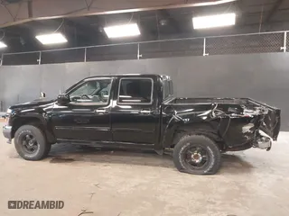 2012 Chevrolet Colorado LT w/2LT with VIN 1GCHTDFE1C8163055, listed as a IAAI auction lot 41787809 with 131,273 mi miles. Bid and sale history available at carsss.com. Image 14.