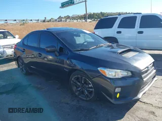2016 Subaru WRX Premium with VIN JF1VA1E63G9815035, listed as a IAAI auction lot 41782167 with 211,387 mi miles. Bid and sale history available at carsss.com. Image 1.