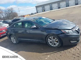 2011 Kia Optima EX with VIN KNAGN4A75B5156895, listed as a IAAI auction lot 41729991 with 151,348 mi miles. Bid and sale history available at carsss.com. Image 13.
