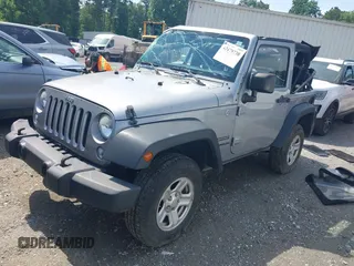 2014 Jeep Wrangler Sport with VIN 1C4AJWAG6EL192448, listed as a IAAI auction lot 42479738 with 44,848 mi miles and . Bid and sale history available at DreamBid. Image 2.
