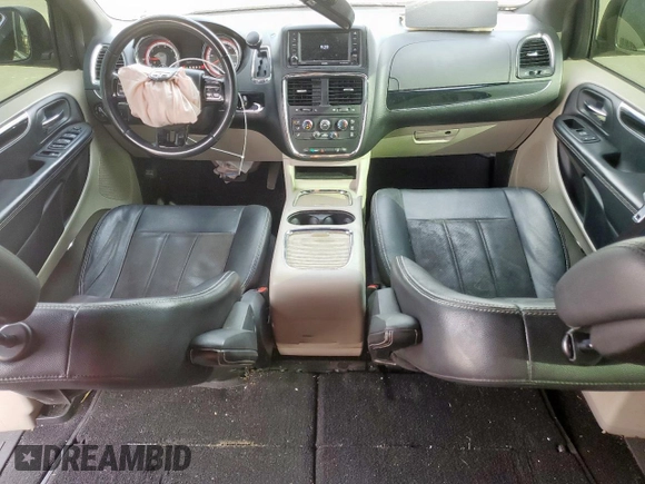 2019 Dodge Grand Caravan SXT with VIN 2C4RDGCG9KR662312, listed as a Copart auction lot 48182105 with 191,199 mi miles and Salvage Title. Bid and sale history available at DreamBid. Image 8.