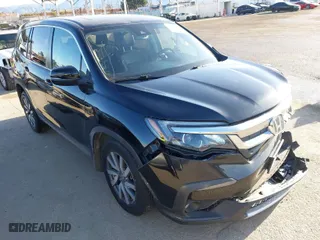 2019 Honda Pilot EX-L with VIN 5FNYF6H5XKB088337, listed as a IAAI auction lot 41944639 with 111,396 mi miles. Bid and sale history available at carsss.com. Image 1.