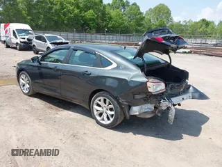 2014 Chevrolet Impala LT with VIN 2G1125S36E9156519, listed as a IAAI auction lot 42145424 with 97,755 mi miles and . Bid and sale history available at DreamBid. Image 3.