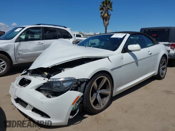 2009 BMW 6 Series 650i z VIN WBAEB53579CX64649, wystawiony jako IAAI lot #41937705 z przebiegiem 136 164 mil mil oraz . Historia ofert i sprzedaży dostępna na DreamBid. Obrazek 18.
