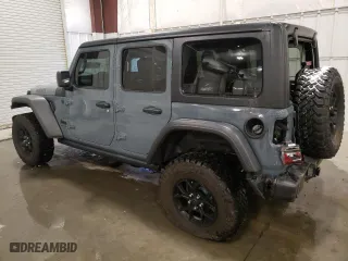 2024 Jeep Wrangler Sport with VIN 1C4PJXDG0RW346653, listed as a Copart auction lot 87248084 with 1,650 mi miles and Salvage Title. Bid and sale history available at carsss.com. Image 2.