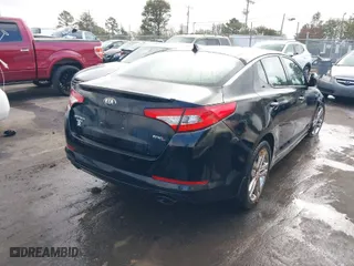 2013 Kia Optima SX w/Limited Pkg with VIN 5XXGR4A6XDG121265, listed as a IAAI auction lot 40771144 with 129,247 mi miles. Bid and sale history available at carsss.com. Image 4.