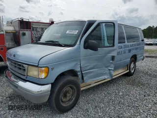 1999 Ford Econoline Passenger XL with VIN 1FBSS31S4XHC00657, listed as a Copart auction lot 58905335 with 90,323 mi miles and Salvage title. Bid and sale history available at DreamBid. Image 1.