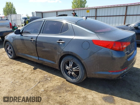 2011 Kia Optima LX with VIN KNAGM4A79B5063381, listed as a IAAI auction lot 42157171 with 175,069 mi miles and . Bid and sale history available at carsss.com. Image 3.