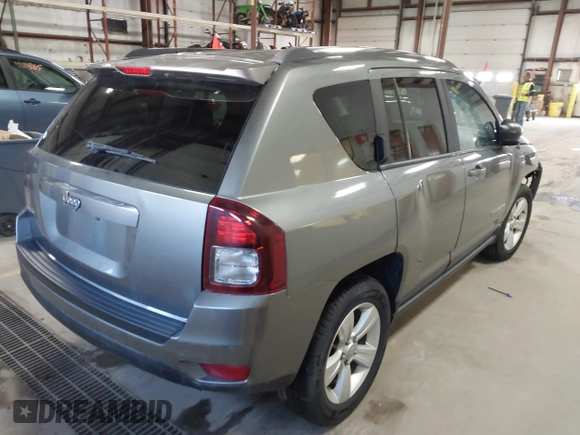 2014 Jeep Compass Sport with VIN 1C4NJDBB5ED567863, listed as a IAAI auction lot 41704644 with 163,405 mi miles. Bid and sale history available at carsss.com. Image 4.