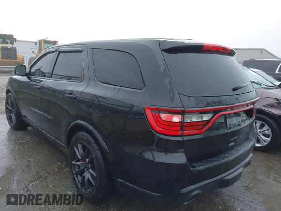 2019 Dodge Durango SRT with VIN 1C4SDJGJXKC550910, listed as a IAAI auction lot 41497932 with 62,541 mi miles and . Bid and sale history available at DreamBid. Image 3.