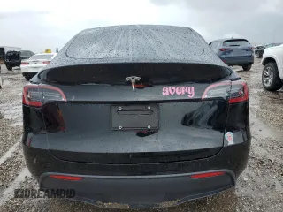 2024 Tesla Model Y z VIN 7SAYGDED7RF018059, wystawiony jako Copart lot #54273785 z przebiegiem 30 080 mil mil oraz Szkoda całkowita • Salvage title. Historia ofert i sprzedaży dostępna na DreamBid. Obrazek 6.