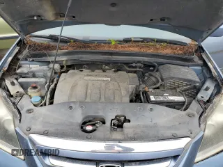 2005 Honda Odyssey EX-L with VIN 5FNRL38705B030402, listed as a Copart auction lot 54888425 with 196,215 mi miles and Clean title. Bid and sale history available at DreamBid. Image 12.