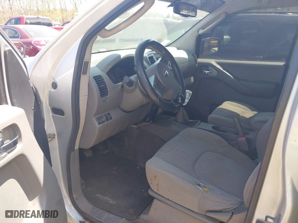 2011 Nissan Frontier PRO-4X with VIN 1N6AD0EVXBC407089, listed as a IAAI auction lot 42113537 with 124,853 mi miles. Bid and sale history available at carsss.com. Image 5.