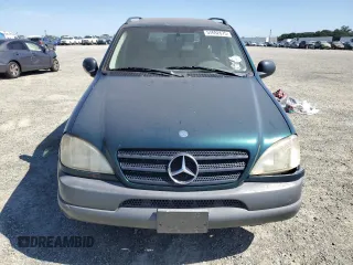 1999 Mercedes-Benz M 320/430/500 z VIN 4JGAB54E4XA106856, wystawiony jako Copart lot #57692675 z przebiegiem 250 488 mil mil oraz Czysty tytuł • Clean title. Historia ofert i sprzedaży dostępna na DreamBid. Obrazek 5.