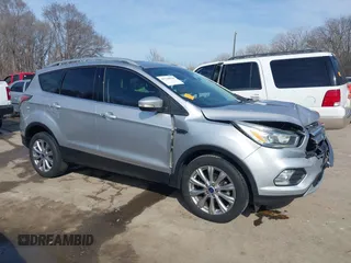 2017 Ford Escape Titanium with VIN 1FMCU0JD3HUB13234, listed as a IAAI auction lot 41760944 with 113,361 mi miles. Bid and sale history available at carsss.com. Image 13.