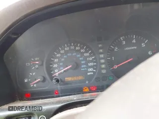 1999 Toyota Land Cruiser z VIN JT3HT05JXX0060572, wystawiony jako IAAI lot #42489190 z przebiegiem 253 014 mil mil oraz . Historia ofert i sprzedaży dostępna na DreamBid. Obrazek 7.