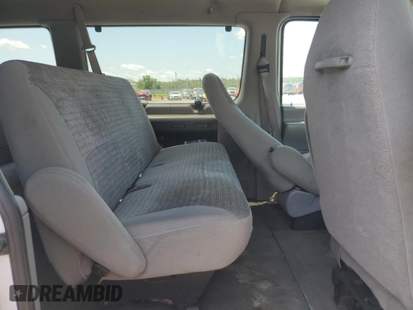 2001 Ford Econoline Passenger XL with VIN 1FBSS31L41HA22362, listed as a Copart auction lot 61076525 with 97,207 mi miles and Salvage title. Bid and sale history available at DreamBid. Image 11.