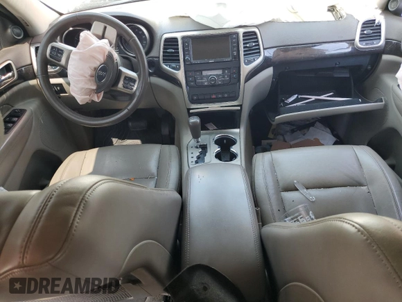 2011 Jeep Grand Cherokee Laredo with VIN 1J4RR4GG6BC657520, listed as a Copart auction lot 63558355 with 215,444 mi miles and Salvage title. Bid and sale history available at DreamBid. Image 8.