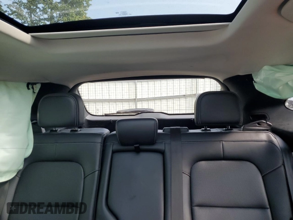 2021 Ford Escape SEL Hybrid z VIN 1FMCU9CZ7MUA94260, wystawiony jako Copart lot #71013514 z przebiegiem Nie podano mil oraz Szkoda całkowita • Salvage title. Historia ofert i sprzedaży dostępna na DreamBid. Obrazek 10.