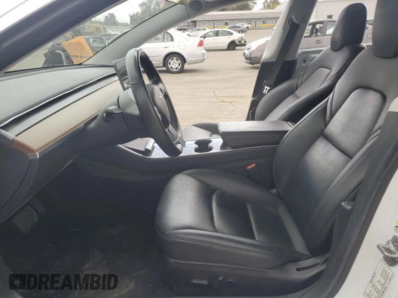 2019 Tesla Model 3 Mid Range with VIN 5YJ3E1EA8KF412886, listed as a Copart auction lot 50824565 with 54,803 mi miles and Salvage Title. Bid and sale history available at carsss.com. Image 7.