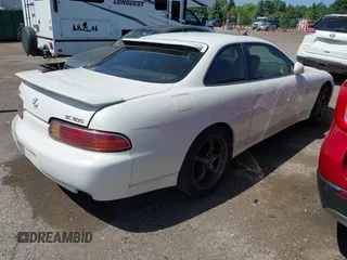 1997 Lexus SC 300 with VIN JT8CD32Z2V0039032, listed as a IAAI auction lot 42556454 with 164,629 mi miles and . Bid and sale history available at DreamBid. Image 4.