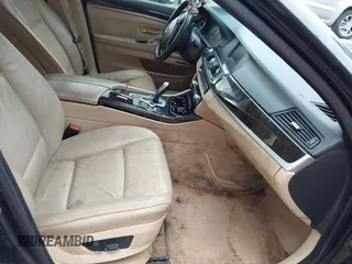 2012 BMW 5 Series 528i with VIN WBAXG5C51CDY28325, listed as a IAAI auction lot 41348221 with 125,039 mi miles. Bid and sale history available at carsss.com. Image 5.