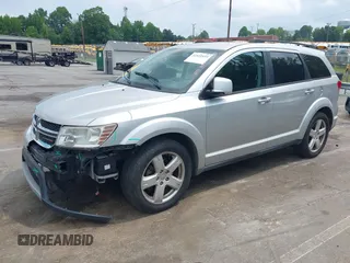 2012 Dodge Journey SXT z VIN 3C4PDCBGXCT324756, wystawiony jako IAAI lot #42422533 z przebiegiem 241 934 mil mil oraz . Historia ofert i sprzedaży dostępna na DreamBid. Obrazek 17.