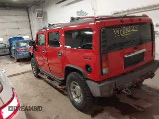 2004 Hummer H2 with VIN 5GRGN23U24H114730, listed as a IAAI auction lot 41605451 with 122,658 mi miles. Bid and sale history available at carsss.com. Image 3.