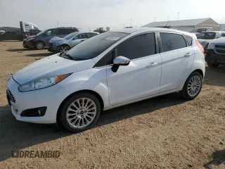2014 Ford Fiesta Titanium z VIN 3FADP4FJ0EM111971, wystawiony jako Copart lot #54506515 z przebiegiem 173 006 mil mil oraz Szkoda całkowita • Salvage title. Historia ofert i sprzedaży dostępna na DreamBid. Obrazek 1.