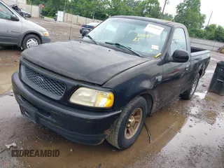 1998 Ford F-150 with VIN 1FTYF17W0WNC12927, listed as a IAAI auction lot 42621641 with 251,079 mi miles and . Bid and sale history available at DreamBid. Image 2.