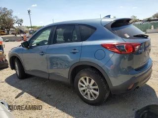 2016 Mazda CX-5 Touring with VIN JM3KE2CY0G0894283, listed as a Copart auction lot 50592065 with 86,400 mi miles and Salvage Title. Bid and sale history available at carsss.com. Image 2.