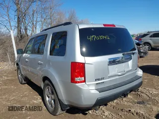 2009 Honda Pilot EX with VIN 5FNYF48479B002570, listed as a IAAI auction lot 41703942 with 146,405 mi miles. Bid and sale history available at carsss.com. Image 3.