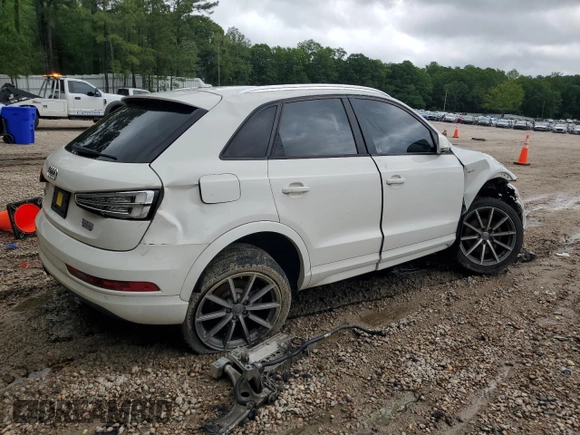 2018 Audi Q3 Premium с VIN WA1BCCFS4JR014601, выставлен на аукционе Copart как лот 56539595 с пробегом 97 142 миль миль и Списание • Salvage title. История ставок и продаж доступна на DreamBid. Изображение 3.