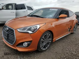 2016 Hyundai Veloster Turbo z VIN KMHTC6AE0GU272841, wystawiony jako Copart lot #82777274 z przebiegiem 109 409 mil mil oraz Szkoda całkowita • Salvage title. Historia ofert i sprzedaży dostępna na DreamBid. Obrazek 1.