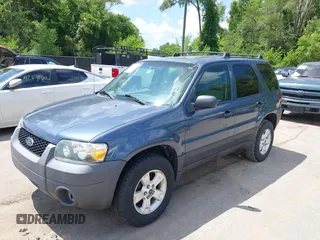 2006 Ford Escape XLT with VIN 1FMYU03156KA28848, listed as a IAAI auction lot 42670534 with 240,890 mi miles and . Bid and sale history available at DreamBid. Image 2.