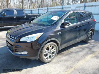2013 Ford Escape SEL with VIN 1FMCU0H9XDUC42566, listed as a IAAI auction lot 42087717 with 233,091 mi miles. Bid and sale history available at carsss.com. Image 2.