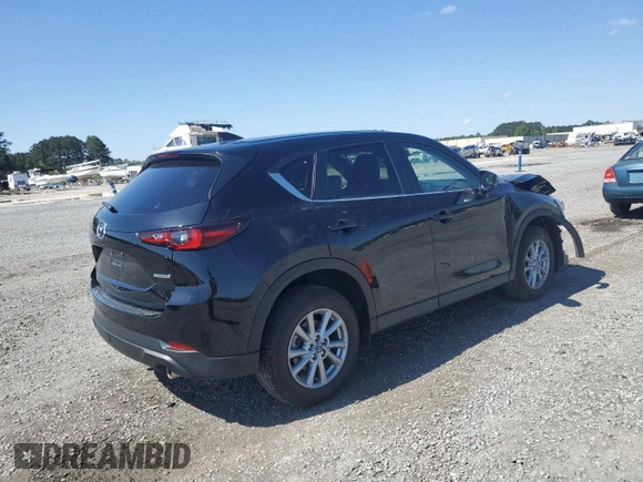 2023 Mazda CX-5 S Carbon Edition z VIN JM3KFBCM3P0264493, wystawiony jako Copart lot #52118475 z przebiegiem 3 195 mil mil oraz Szkoda całkowita • Salvage title. Historia ofert i sprzedaży dostępna na DreamBid. Obrazek 3.
