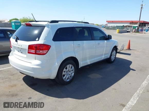 2018 Dodge Journey SE with VIN 3C4PDCAB0JT229335, listed as a IAAI auction lot 42056228 with 157,868 mi miles. Bid and sale history available at carsss.com. Image 4.
