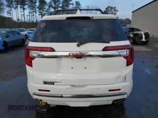 2023 GMC Acadia Denali with VIN 1GKKNPLS1PZ247635, listed as a Copart auction lot 84953044 with 12,869 mi miles and Salvage title. Bid and sale history available at DreamBid. Image 6.