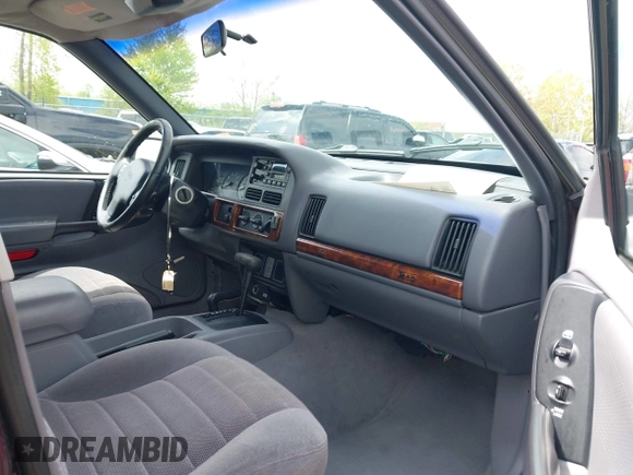1997 Jeep Grand Cherokee Laredo with VIN 1J4GZ58S4VC702040, listed as a IAAI auction lot 42165536 with 121,803 mi miles and . Bid and sale history available at DreamBid. Image 5.