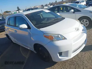 2008 Scion xD with VIN JTKKU10428J013725, listed as a IAAI auction lot 41383639 with 131,651 mi miles. Bid and sale history available at carsss.com. Image 1.