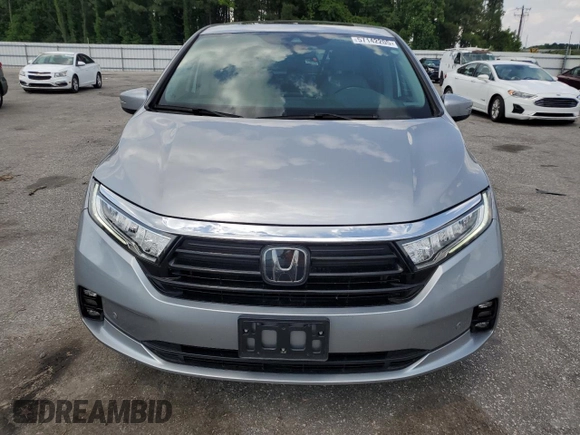 2021 Honda Odyssey Touring z VIN 5FNRL6H85MB039444, wystawiony jako Copart lot #57142205 z przebiegiem 74 228 mil mil oraz Szkoda całkowita • Salvage title. Historia ofert i sprzedaży dostępna na DreamBid. Obrazek 5.