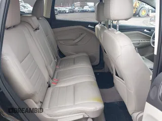 2014 Ford Escape Titanium with VIN 1FMCU9J98EUD73818, listed as a IAAI auction lot 42036442 with 129,794 mi miles. Bid and sale history available at carsss.com. Image 8.